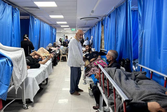 <p>Patients and internally displaced people are pictured at Al-Shifa Hospital in Gaza City</p>