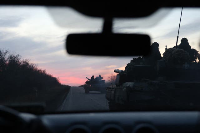 <p>Ukrainian tanks ride on a road outside Avdiivka, Donetsk region</p>