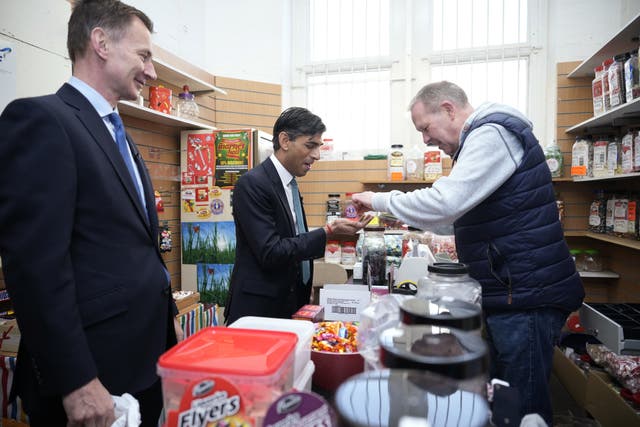 The decline in the rate at which prices are increasing will add to Tory pressure on Rishi Sunak and Jeremy Hunt to cut taxes (Christopher Furlong/PA)