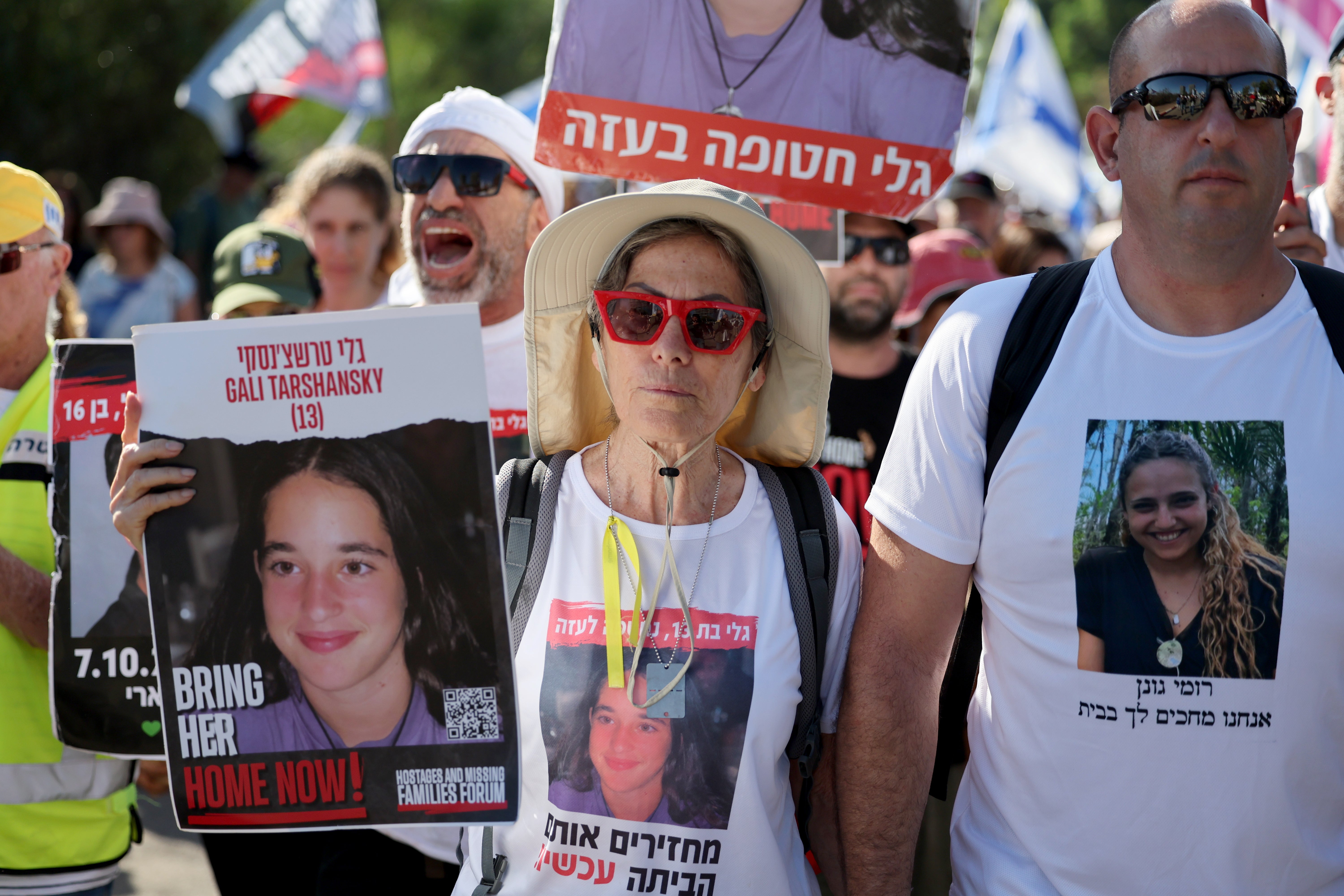 Family members, friends and supporters of the hostages held by Hamas in Gaza take part in a march from Tel Aviv