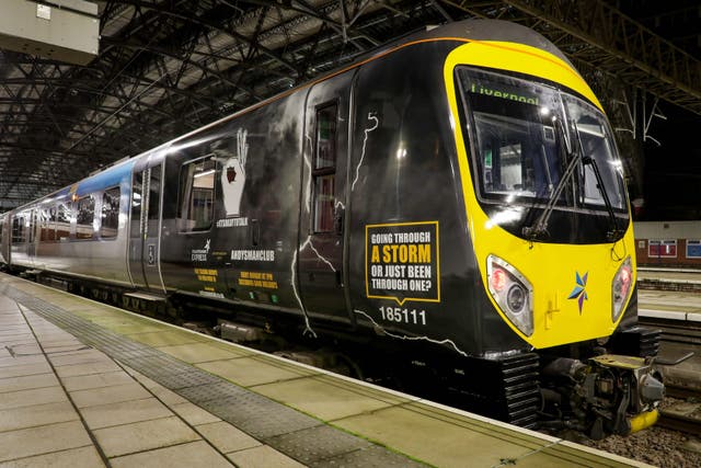 A train has been given new livery to remind passengers ‘it’s OK to talk’ as part of a campaign raising awareness of men’s mental health (TransPennine Express/PA)