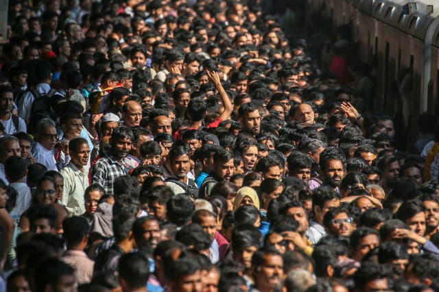 <p>Representative: Indian commuters wait for the local train at Borivali railway station in Mumbai</p>