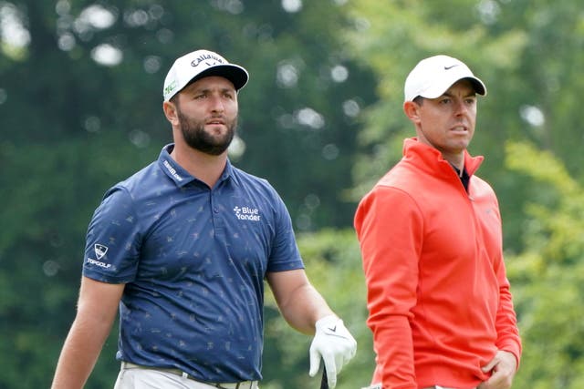 Jon Rahm (left) has no desire to replace Rory McIlroy on the PGA Tour’s policy board (Jane Barlow/PA)