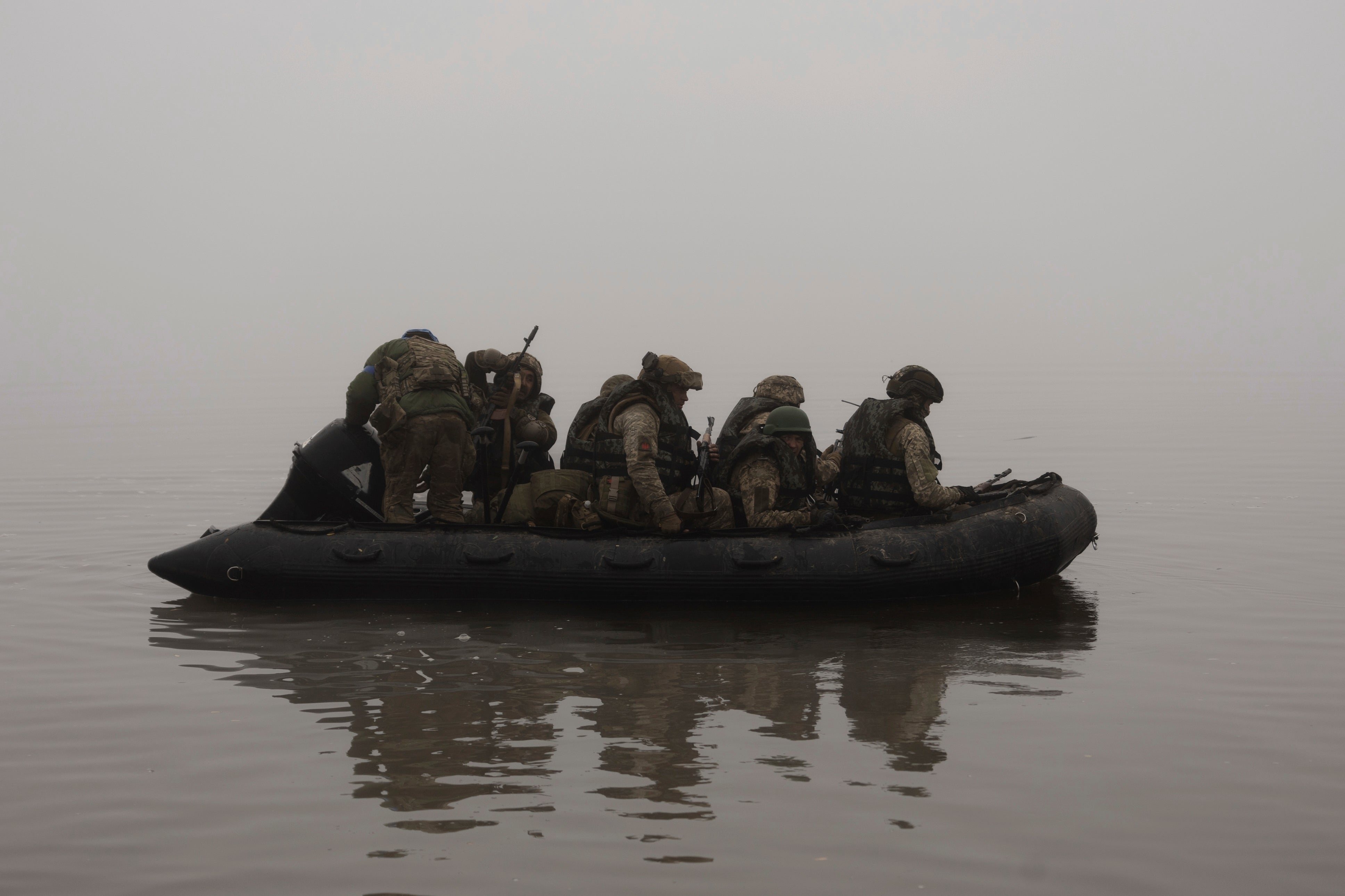Ukrainian marines sail along the Dnipro River at the frontline near Kherson last month