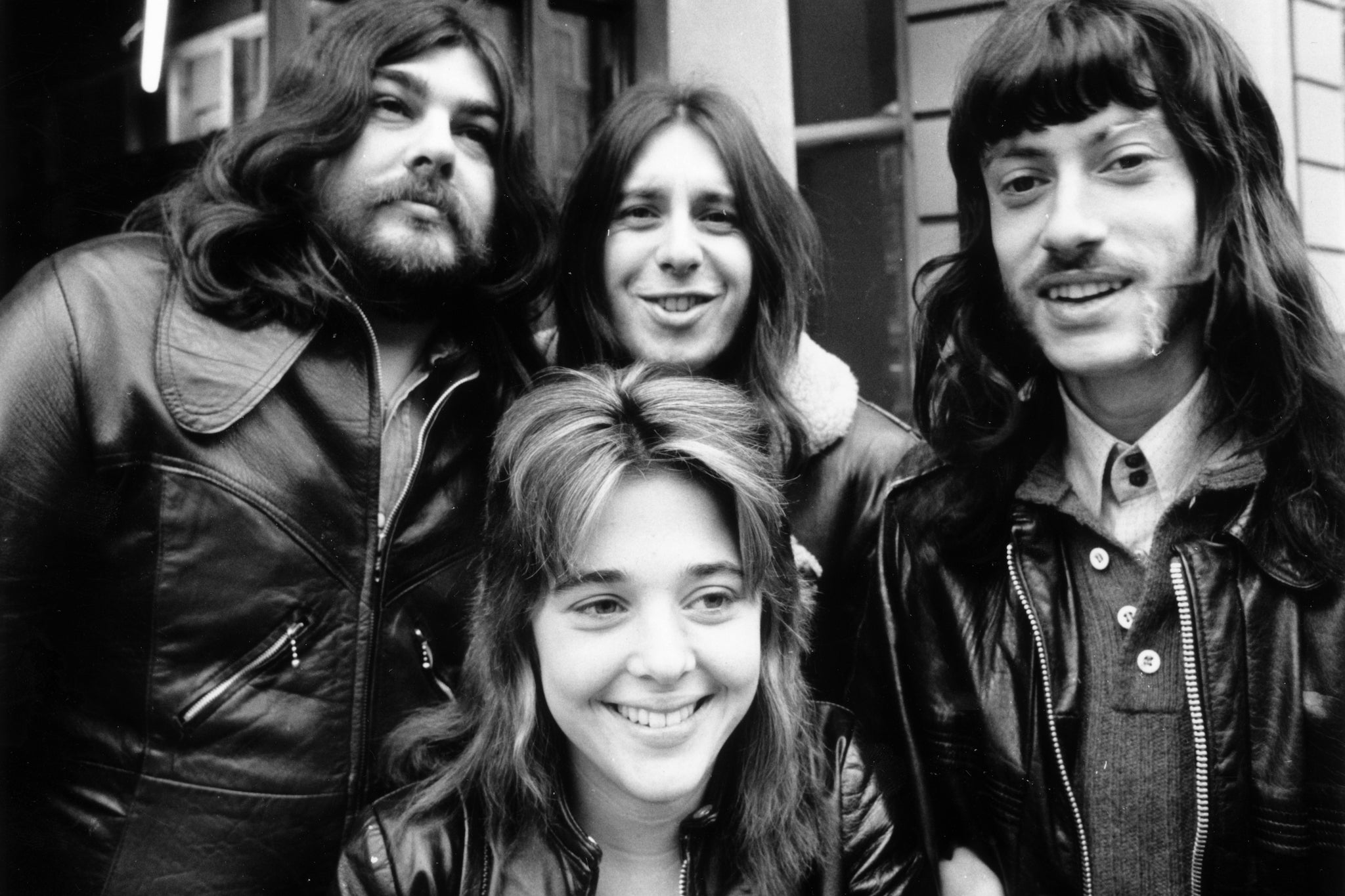 Suzi Quatro and her band on tour with Slade on 6 November 1972. L–R: Len Tuckey (guitarist) whom she later married, Ken Hodge (drums) and Alastair McKenzie (keyboards)