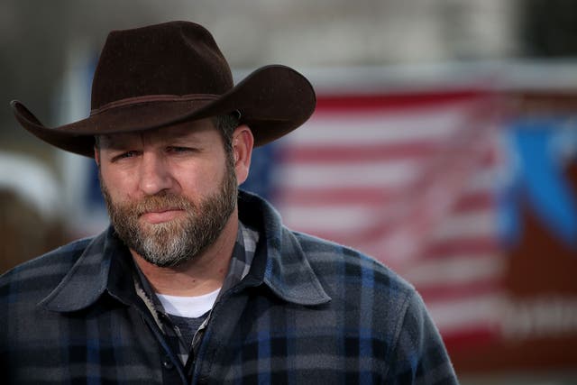 <p>Ammon Bundy, the leader of an anti-government militia, speaks to members of the media in front of the Malheur National Wildlife Refuge Headquarters on January 5, 2016 near Burns, Oregon. </p>
