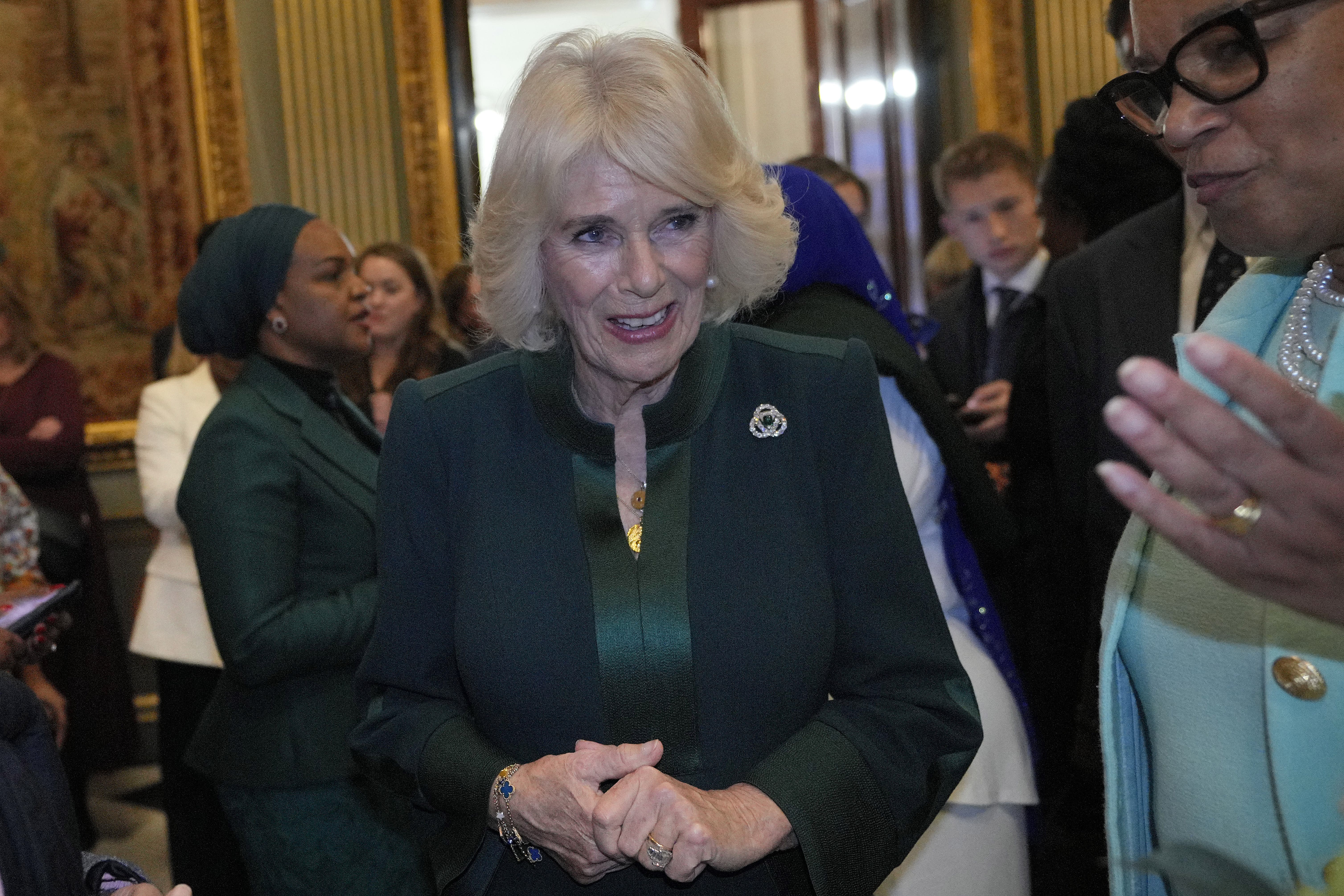 Queen Camilla talks to guests as she attends the Commonwealth Women Leader’s event (Kirsty Wigglesworth/PA)
