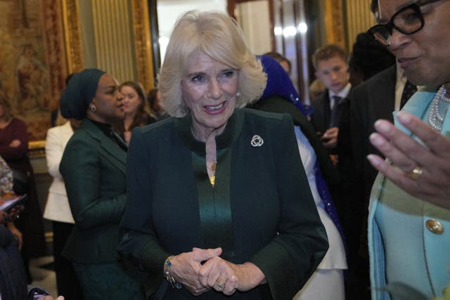 Queen Camilla talks to guests as she attends the Commonwealth Women Leader’s event (Kirsty Wigglesworth/PA)