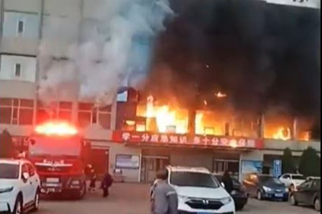 <p>Firefighters evacuated at least 63 people from a four-storey building in Shanxi province</p>