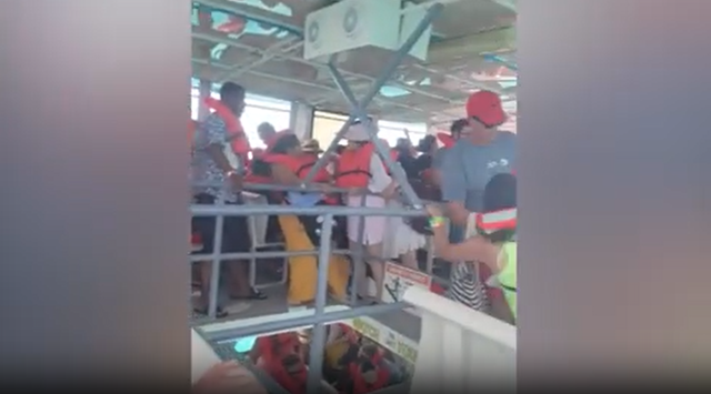 <p>Panicked tourists started to cling to the boat as it sunk into the water </p>