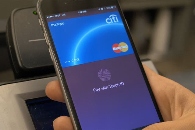 Apple says iPhone users will now be able to access their bank balance in the Wallet app (Apple/PA)