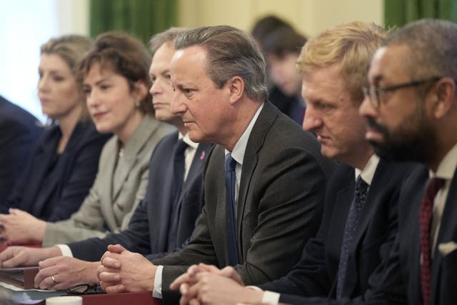 Foreign Secretary David Cameron is not an MP and so cannot sit in the House of Commons (Kin Cheung/PA)