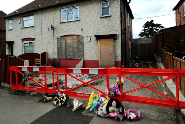 Tributes outside Mick Philpott’s house after he was jailed for life with a minimum term of 15 years for manslaughter in 2013 (Rui Vieira/PA)