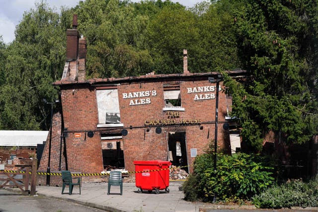 The Crooked House pub was demolished two days after a fire ripped through it (Jacob King/PA)