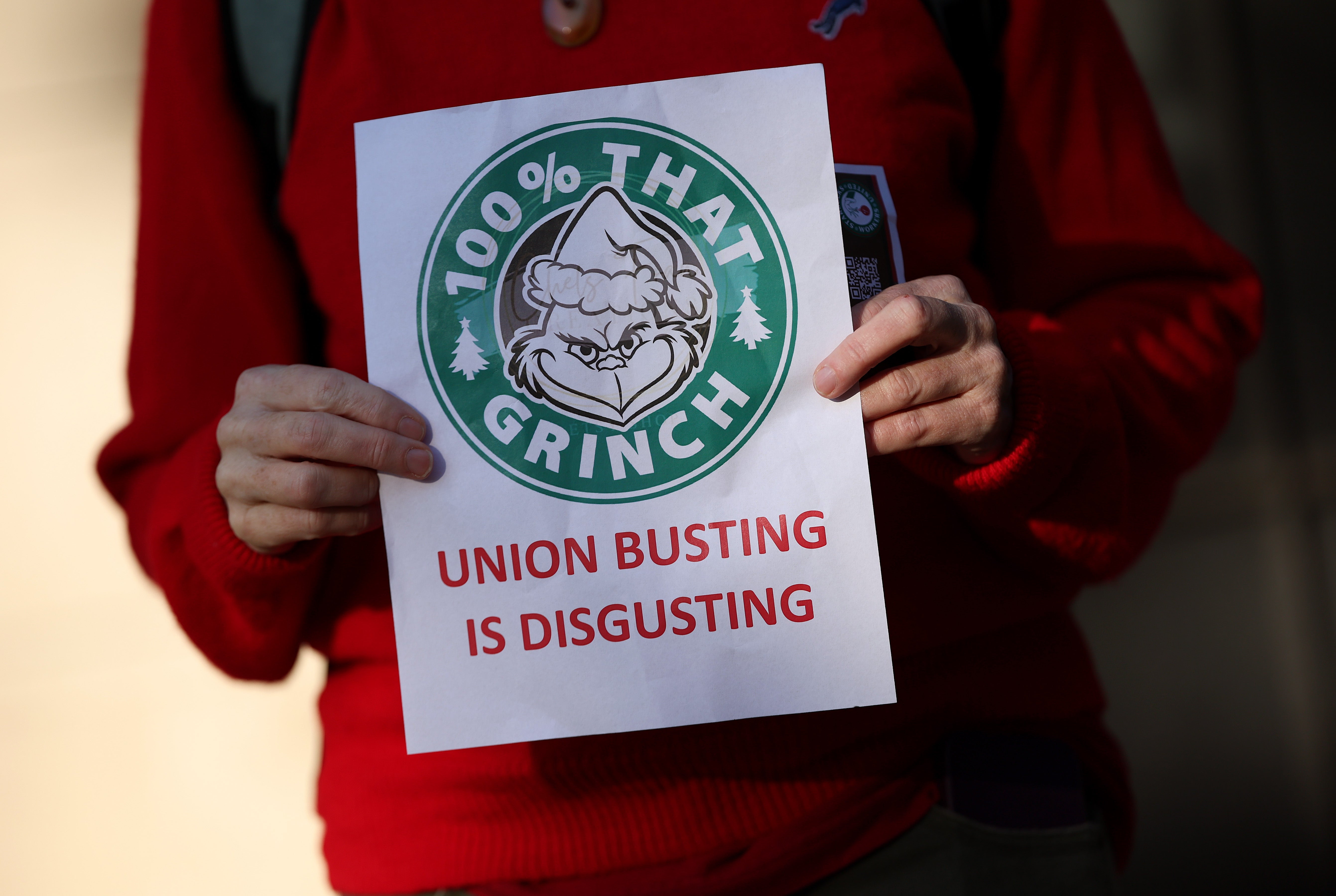 Members and supporters of Starbucks Workers United protest outside of a Starbucks store in Dupont Circle on 16 November 2023 in Washington, DC.