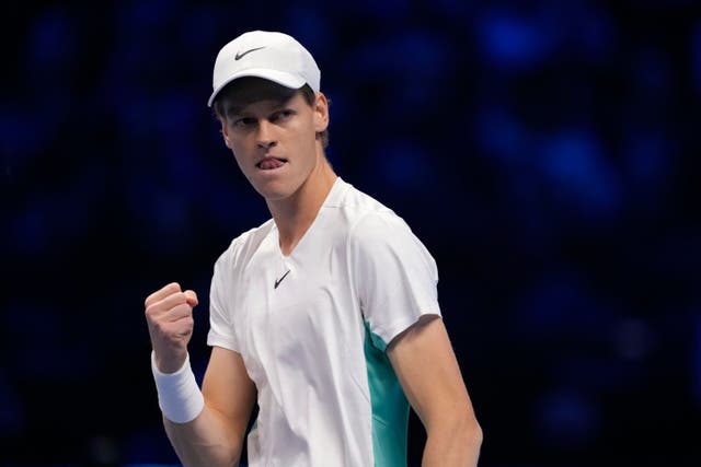 Italy’s Jannik Sinner clenches his fist during his win over Holger Rune (Antonio Calanni/AP)