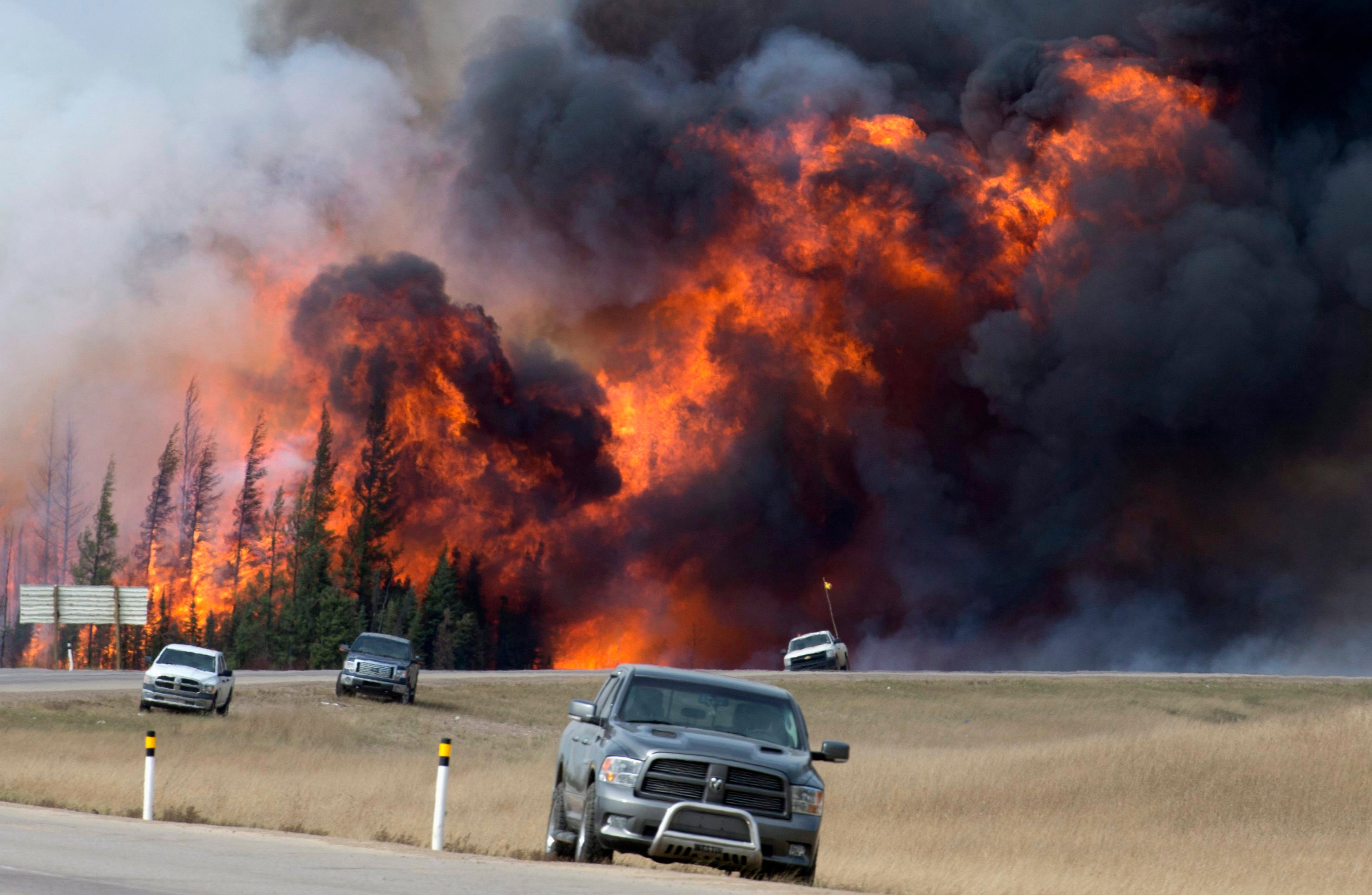 A wildfire rages near Fort McMurray in Alberta in May 2016