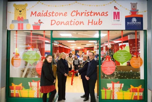 The Maidstone Christmas Donation Hub was opened by the Mayor of Maidstone, Gordon Newton (Maidstone Borough Council/PA)