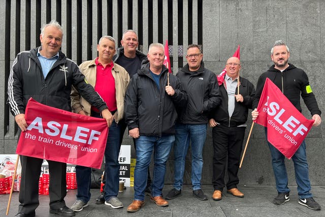 <p>LNER train drivers belonging to the Aslef union outside King’s Cross on a previous day of industrial action</p>