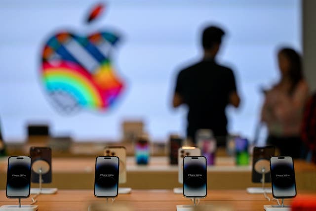 <p>iPhones are on display inside the new Apple retail store during a media preview on the eve of its opening in Mumbai on April 17, 2023</p>