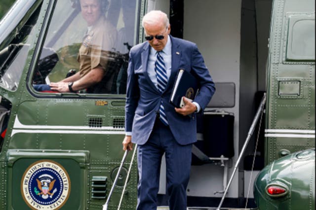 <p>US President Joe Biden walks off Marine One on the South Lawn of the White House on August 14, 2023 </p>