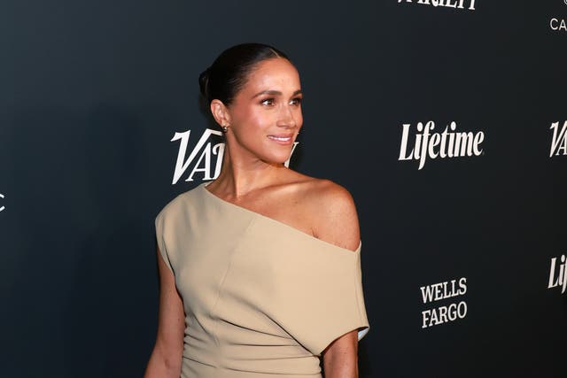 <p>Meghan Markle poses for photographers at an event in Los Angeles </p>