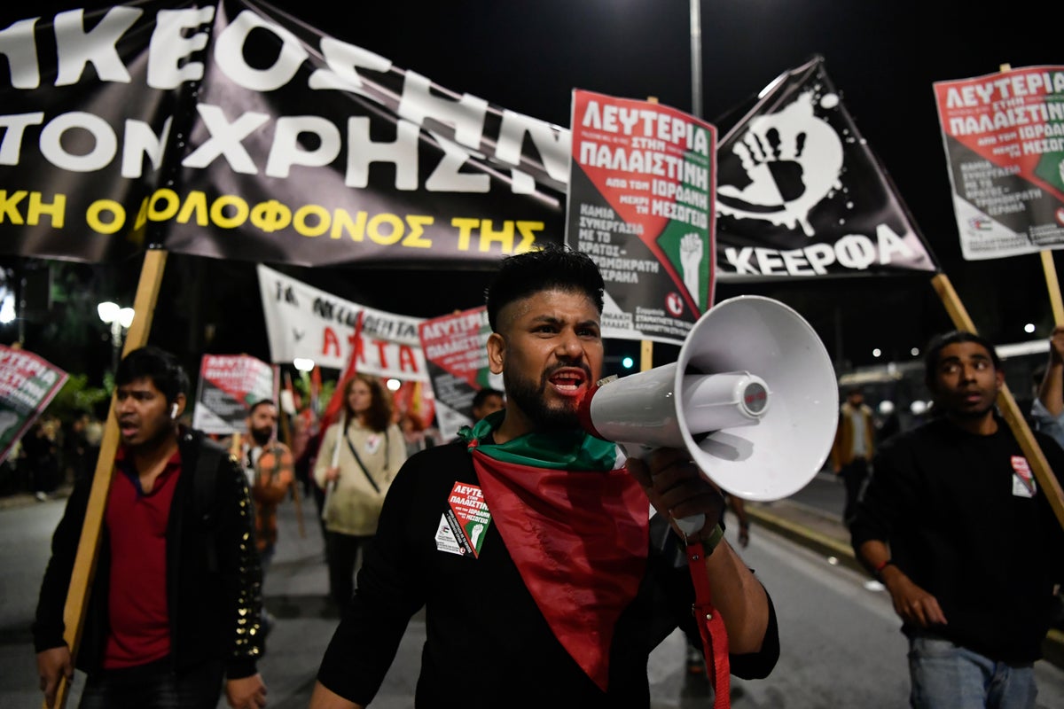 Thousands march through Athens to mark 50 years since a student uprising was crushed by dictatorship