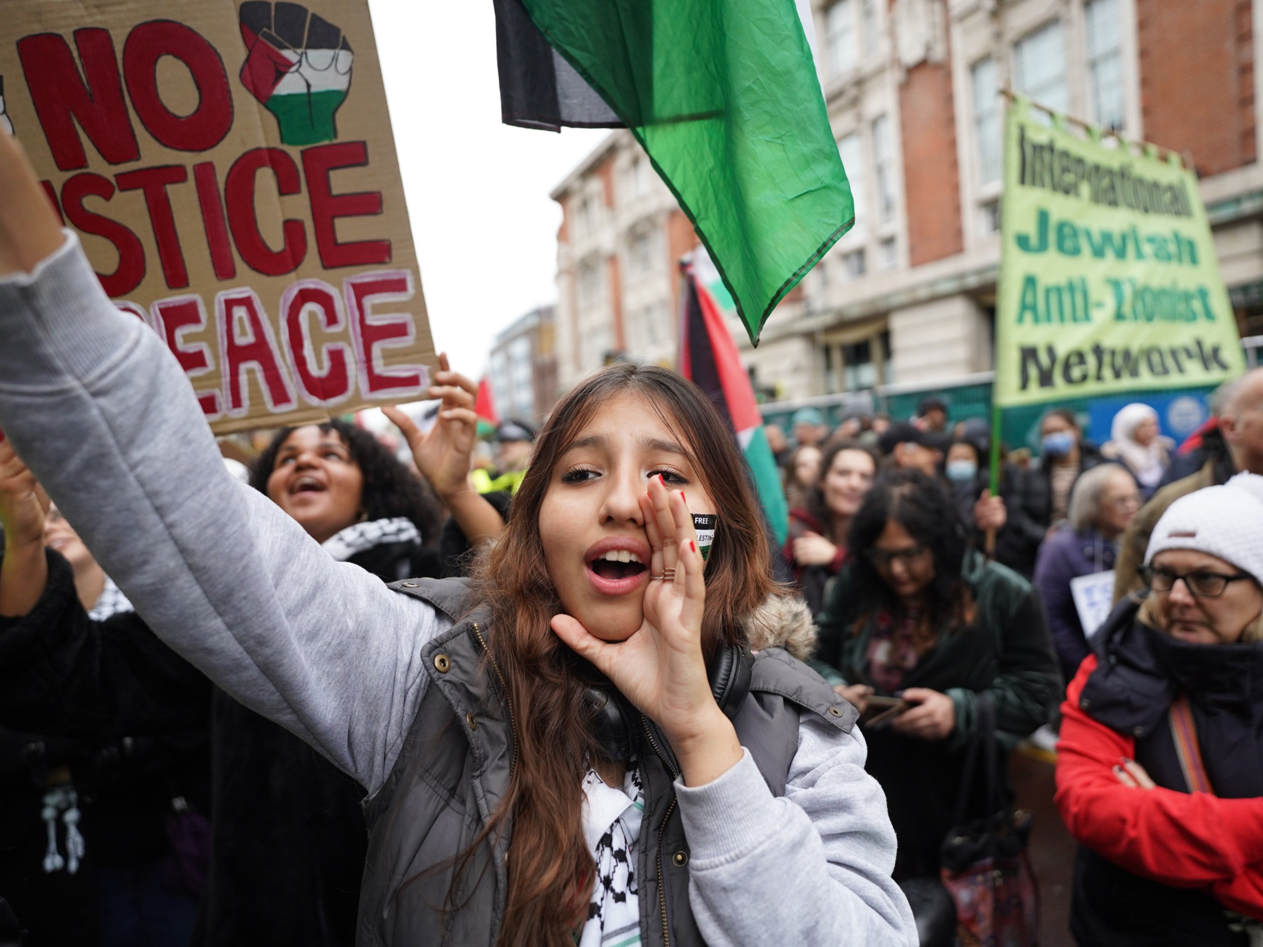 <p>People demonstrate outside Keir Starmer’s constituency office on Saturday</p>