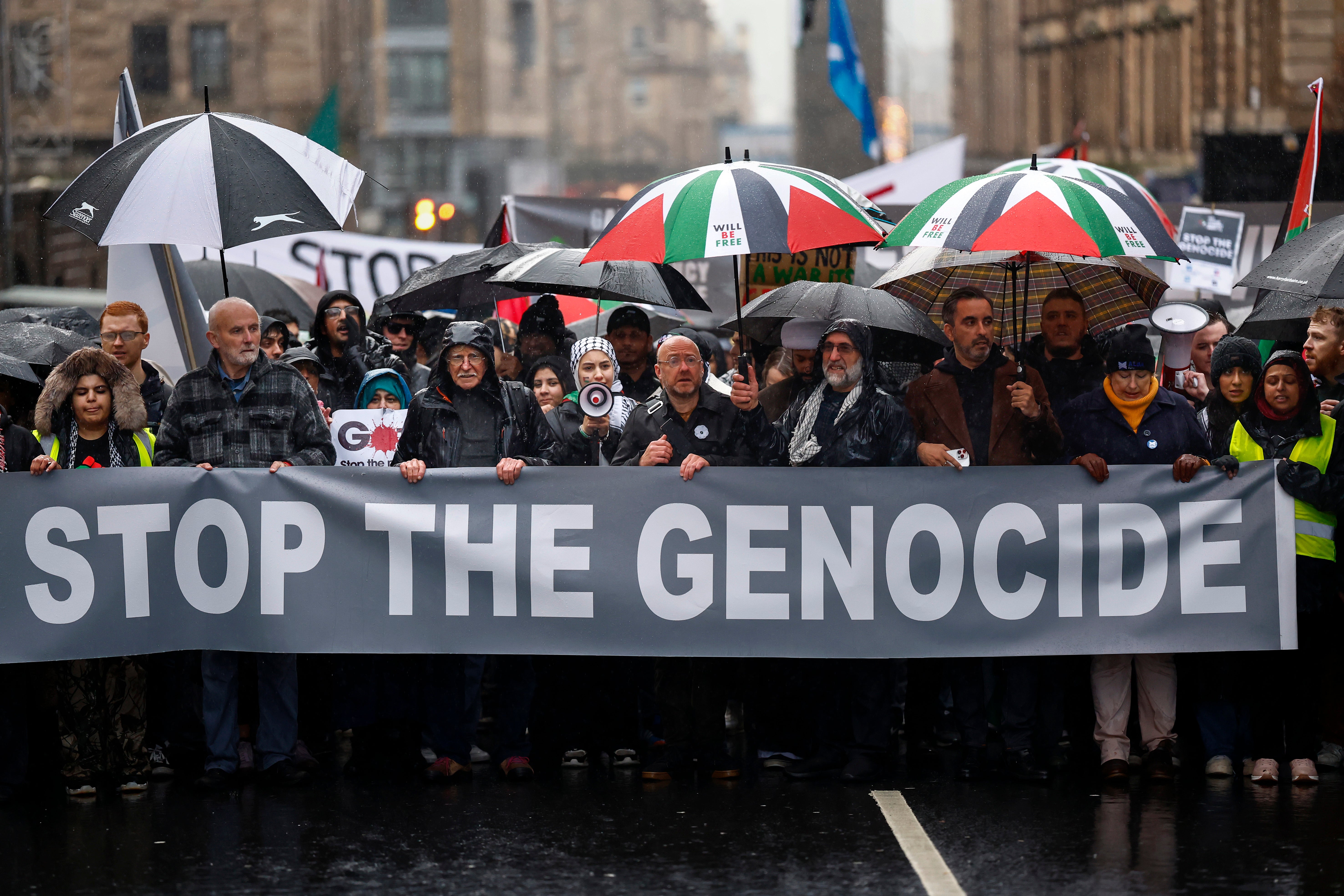 Protesters march through the city during the national protest to demand a ceasefire in the Israel-Hamas war on 18 November 2023 in Glasgow, United Kingdom. Voices across the world calling for a ceasefire in Gaza continue to grow as the IDF pushes deeper into Gaza warning people to move south and evacuation orders are issued for the al Shifa hospital.