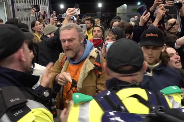 <p>Police officers surround Pro Palestine protesters at Waterloo Station.</p>