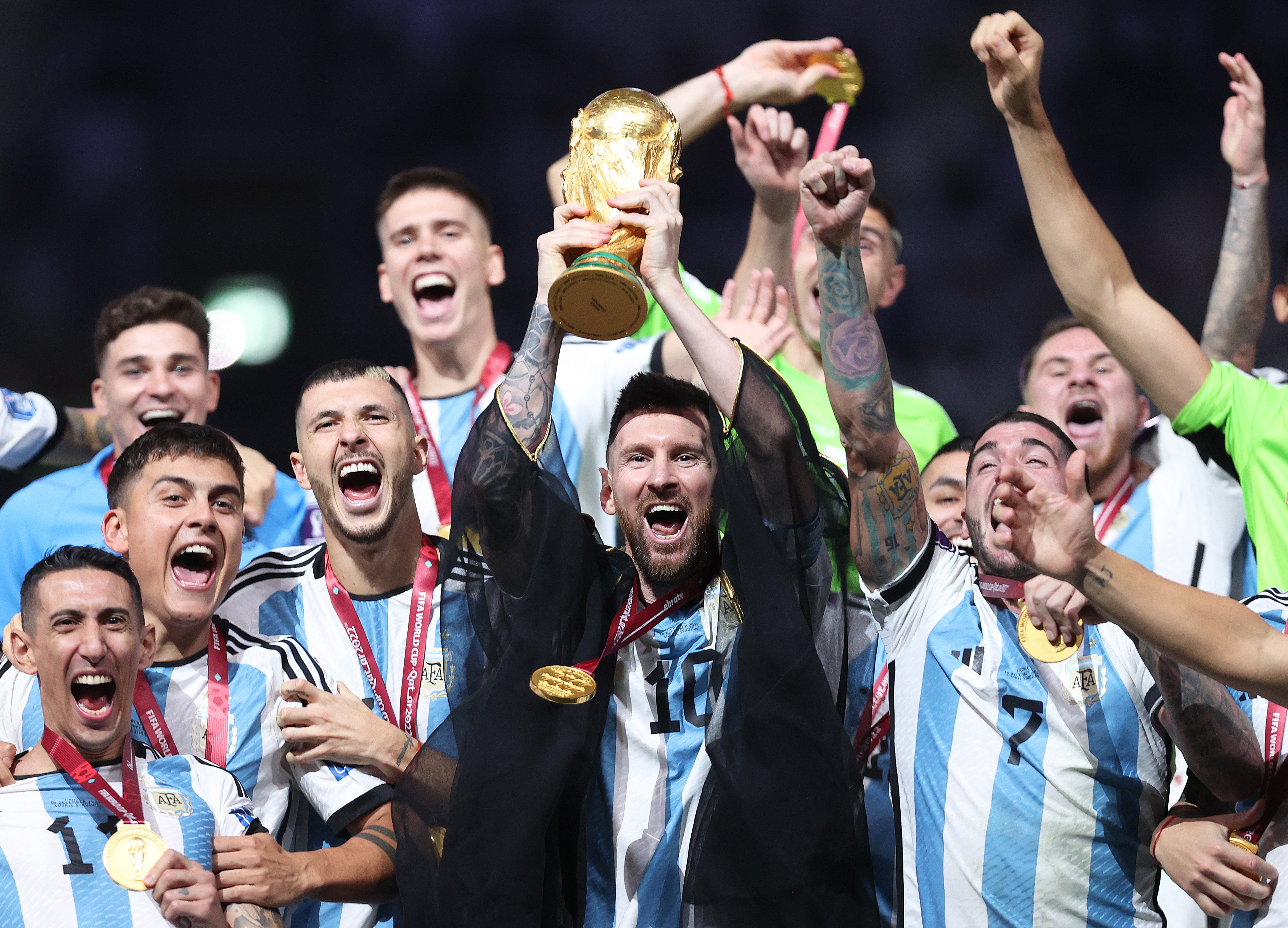 Lionel Messi lifts the Fifa World Cup trophy after Argentina’s penalty shootout win over France at Lusail Stadium on 18 December 2022 in Lusail City, Qatar