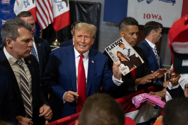 <p>Trump is seen at a campaign rally in Iowa on 18 November</p>