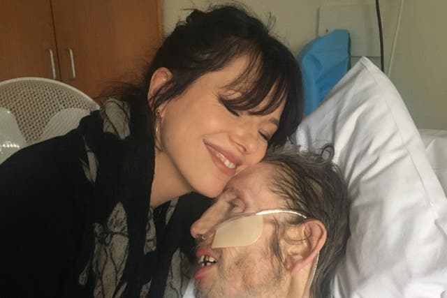 <p>Singer Imelda May hugs Pogues frontman Shane MacGowan, who is being treated in hospital</p>
