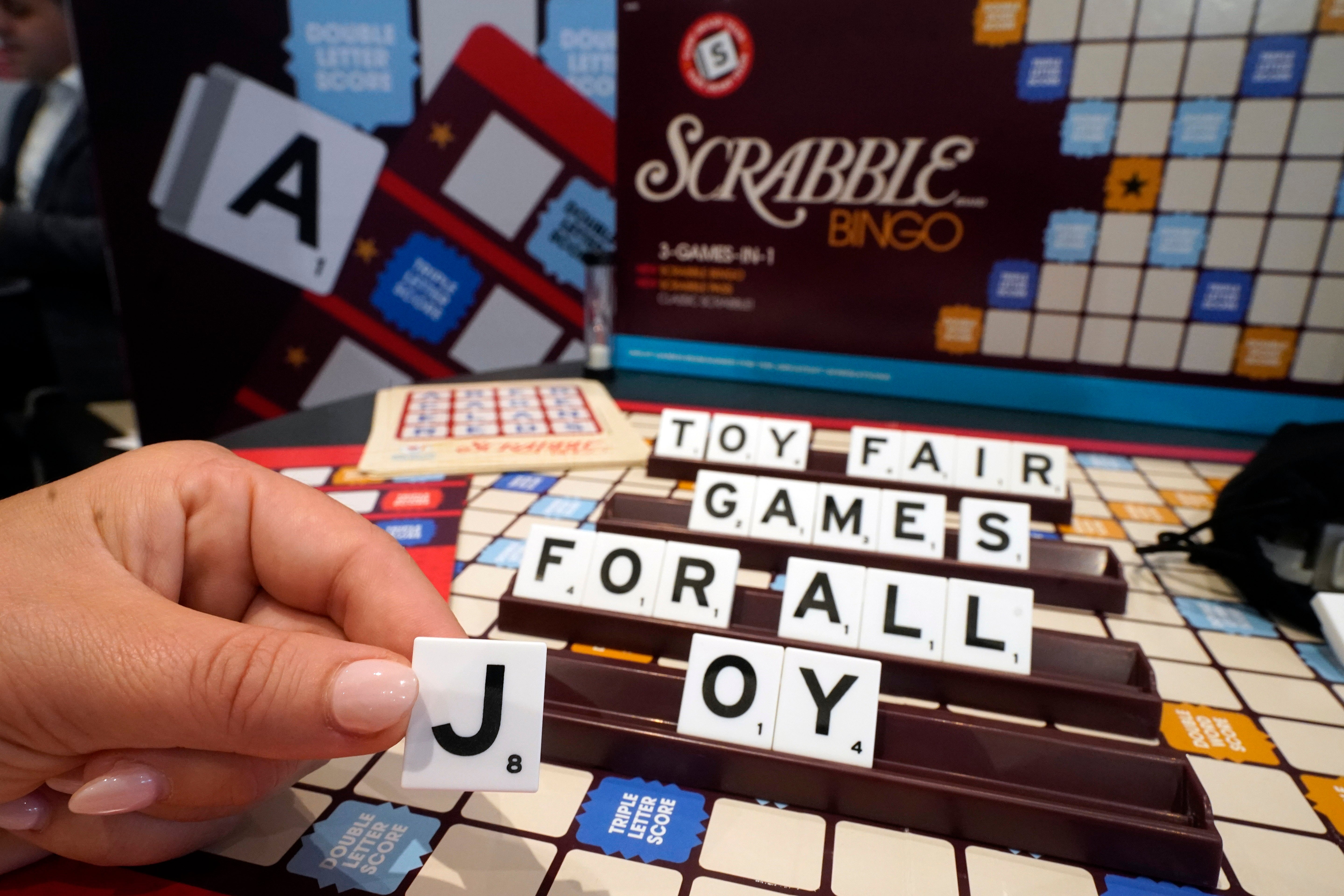 A Scrabble game with larger tiles is displayed at the 2023 Toy Fair, in New York’s Javits Center