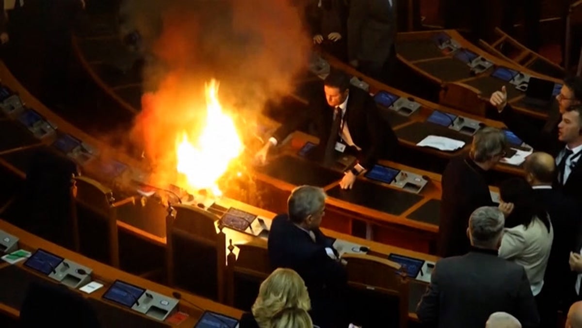 Albanian MPs set off flares to disrupt parliament budget vote