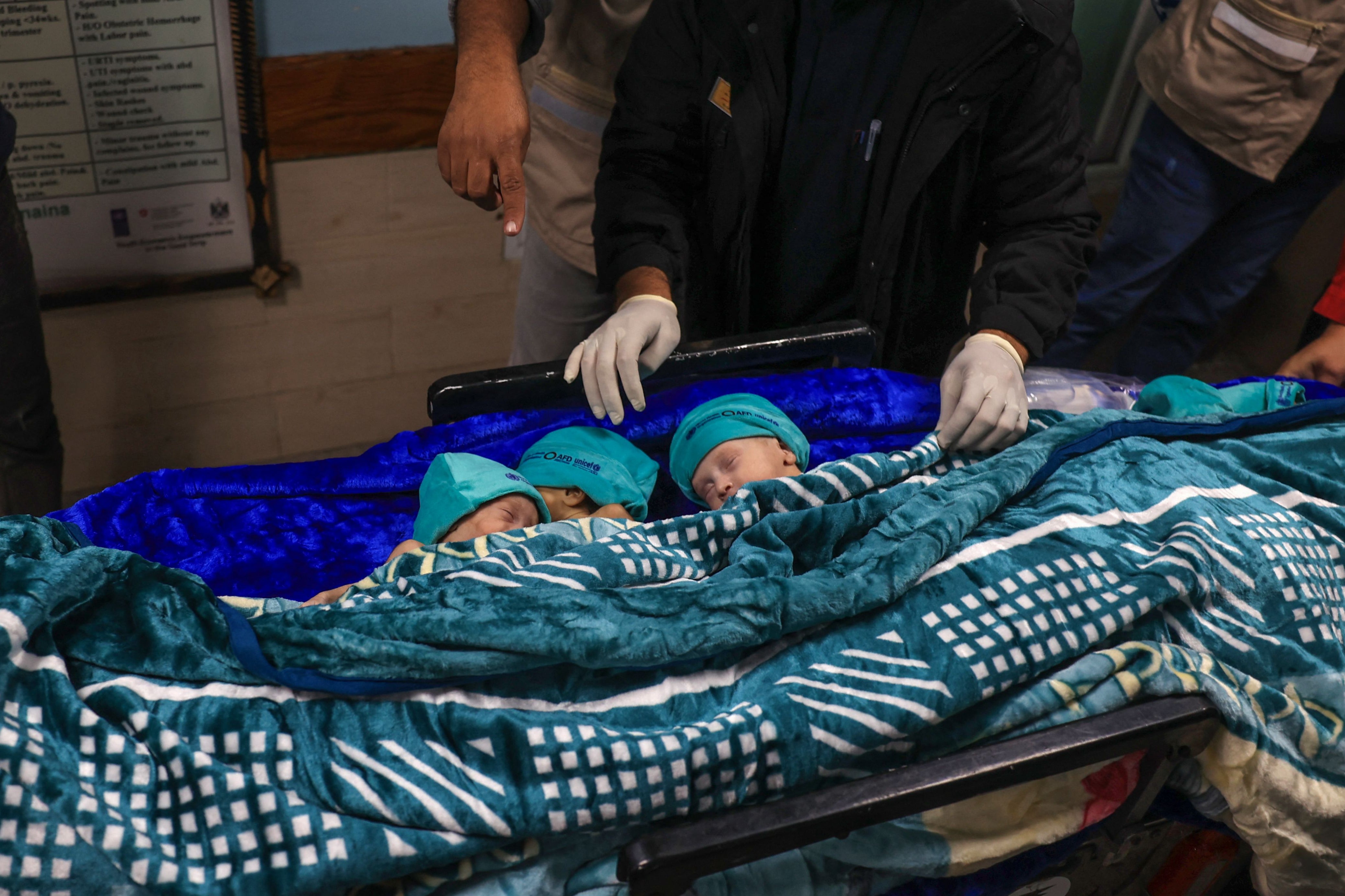Palestinian medics prepare premature babies to move from Rafah, in southern Gaza, to Egypt