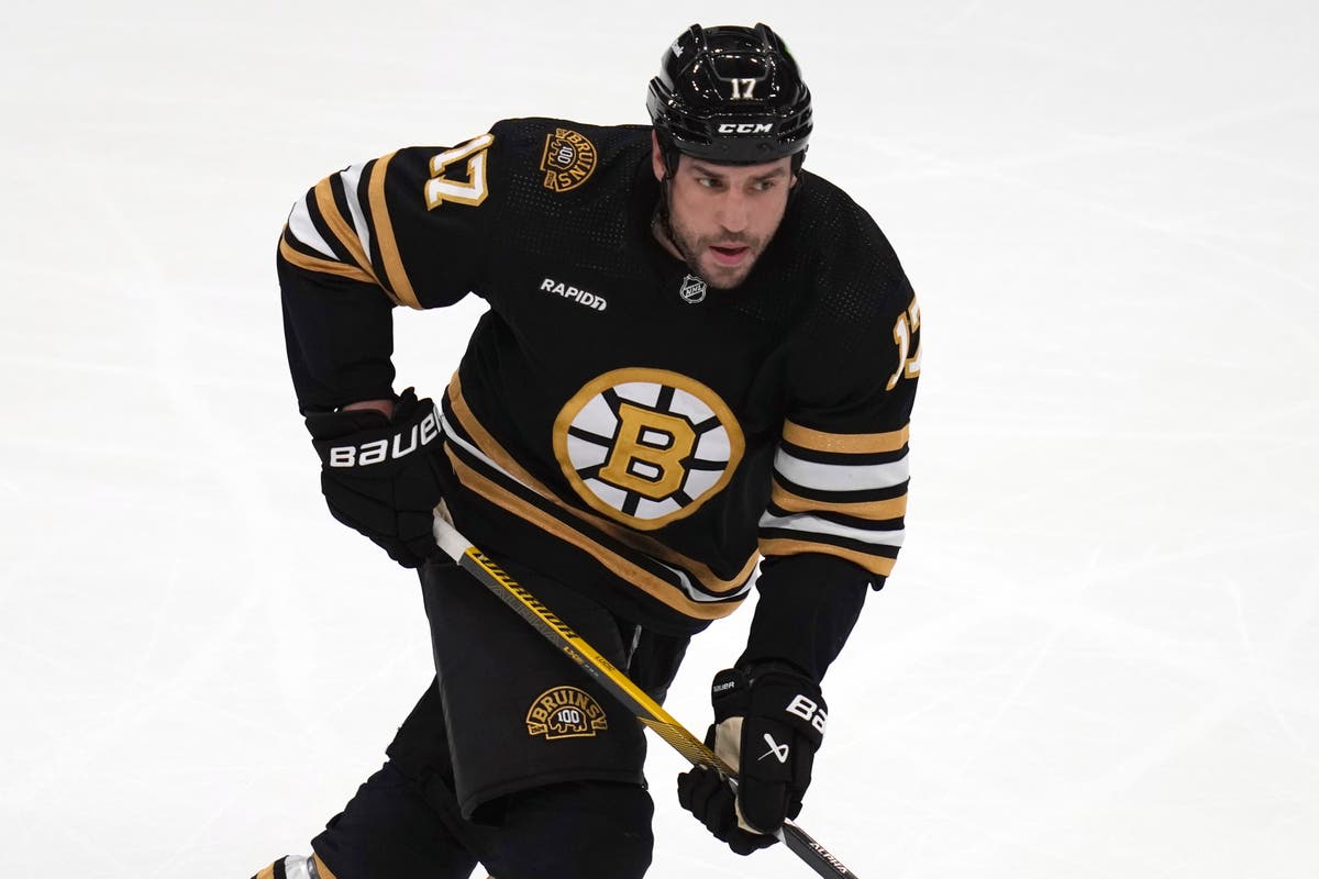 Boston Bruins forward Lucic to be arraigned on assault charge after wife called police to their home