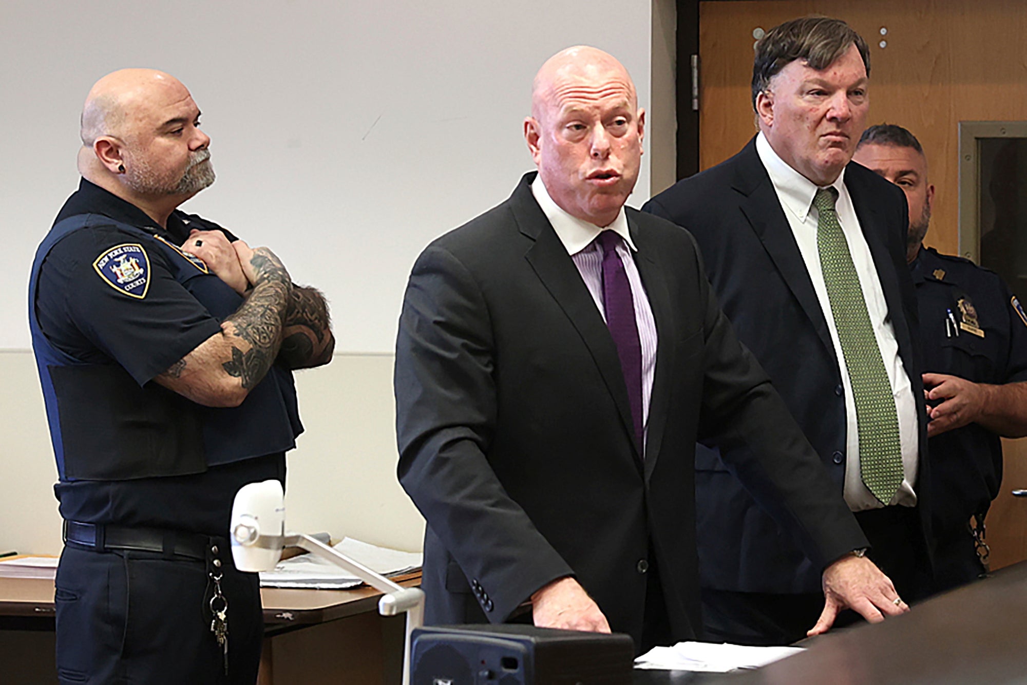 Rex Heuermann, right, appears in Suffolk County Supreme Court with his attorney, Michael Brown, Wednesday 15 November 2023, in Riverhead, New York