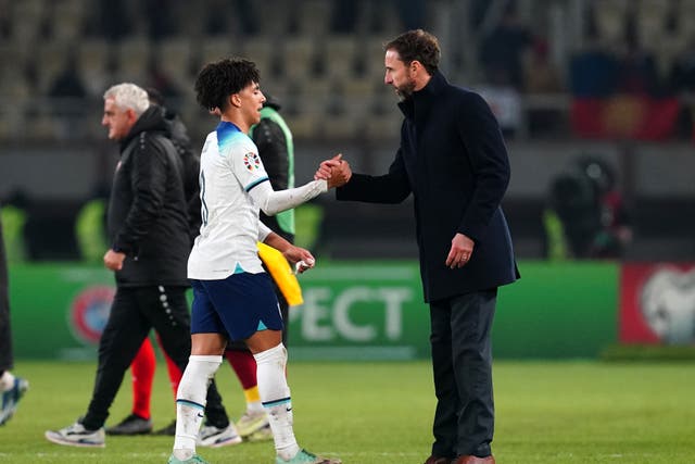 Rico Lewis earned the praise of England manager Gareth Southgate, right (Nick Potts/PA)
