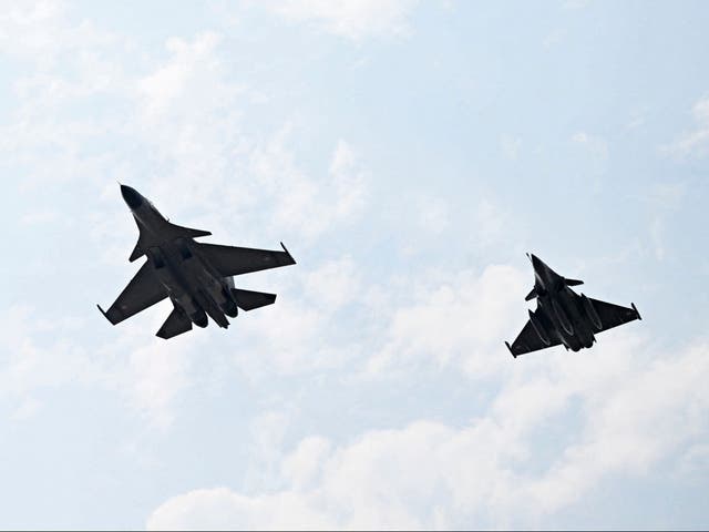 <p>FILE: Indian Air Force fighter jets Rafale (right) and Sukhoi Su-30MKI take part in the joint exercise ‘Ex Garuda-VII’ between IAF and French Air and Space Force (FASF) at Jodhpur in India’s desert state of Rajasthan on 8 November 2022</p>