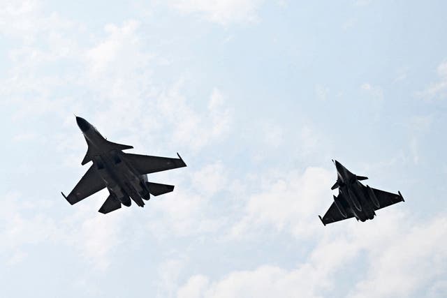 <p>FILE: Indian Air Force fighter jets Rafale (right) and Sukhoi Su-30MKI take part in the joint exercise ‘Ex Garuda-VII’ between IAF and French Air and Space Force (FASF) at Jodhpur in India’s desert state of Rajasthan on 8 November 2022</p>