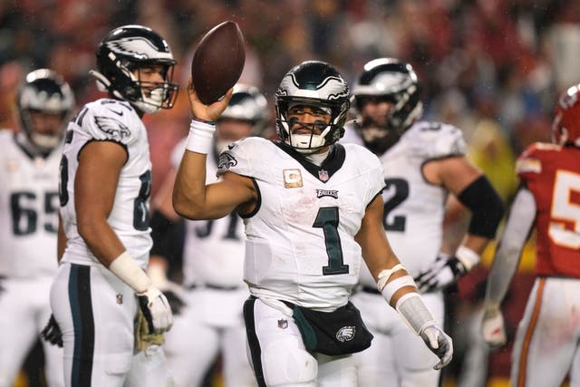 Philadelphia Eagles quarterback Jalen Hurts celebrates after scoring (Charlie Riedel/AP)