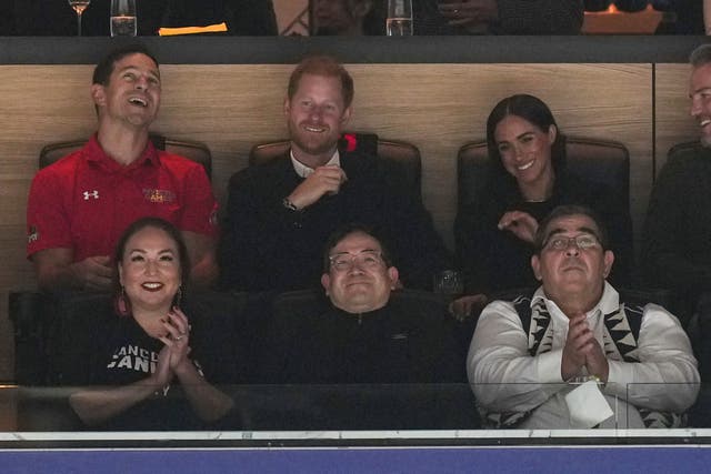 The Duke and Duchess of Sussex make surprise appearance at Vancouver ice hockey game (Darryl Dyck/AP)