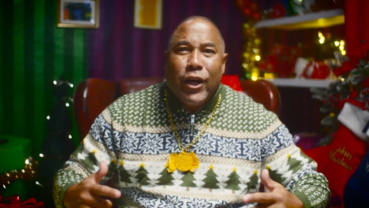 Watch ex-England footballer John Barnes rap in Quality Street Christmas advert