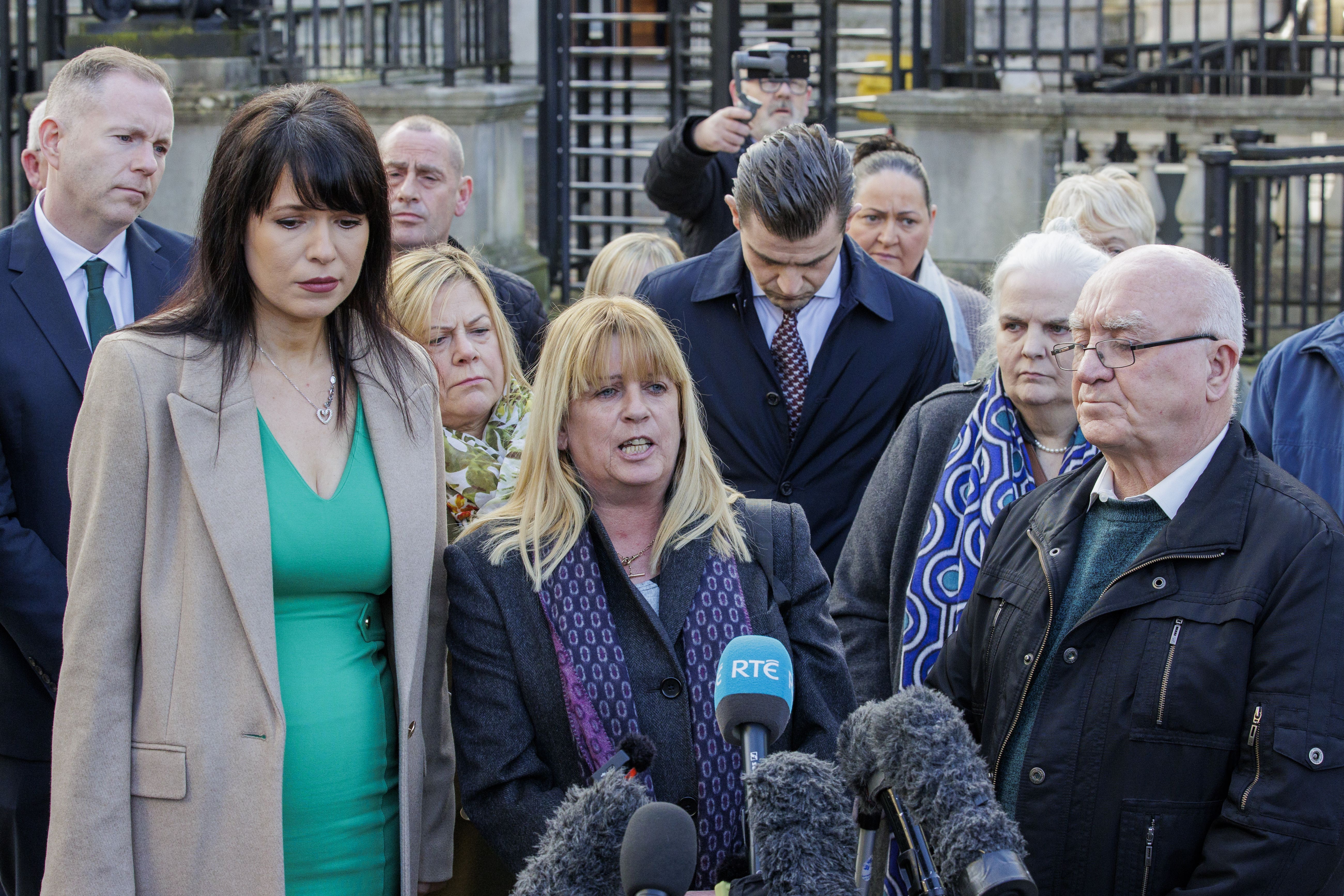 Troubles victim Martina Dillon (centre) speak to the media outside Belfast High Court at the Royal Courts of Justice ahead of a hearing for a legal challenge brought by victims of the Northern Ireland conflict against the UK Government’s widely opposed Troubles Act (Liam McBurney/PA)