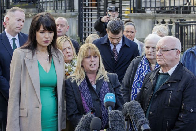 Troubles victim Martina Dillon (centre) speak to the media outside Belfast High Court at the Royal Courts of Justice ahead of a hearing for a legal challenge brought by victims of the Northern Ireland conflict against the UK Government’s widely opposed Troubles Act (Liam McBurney/PA)