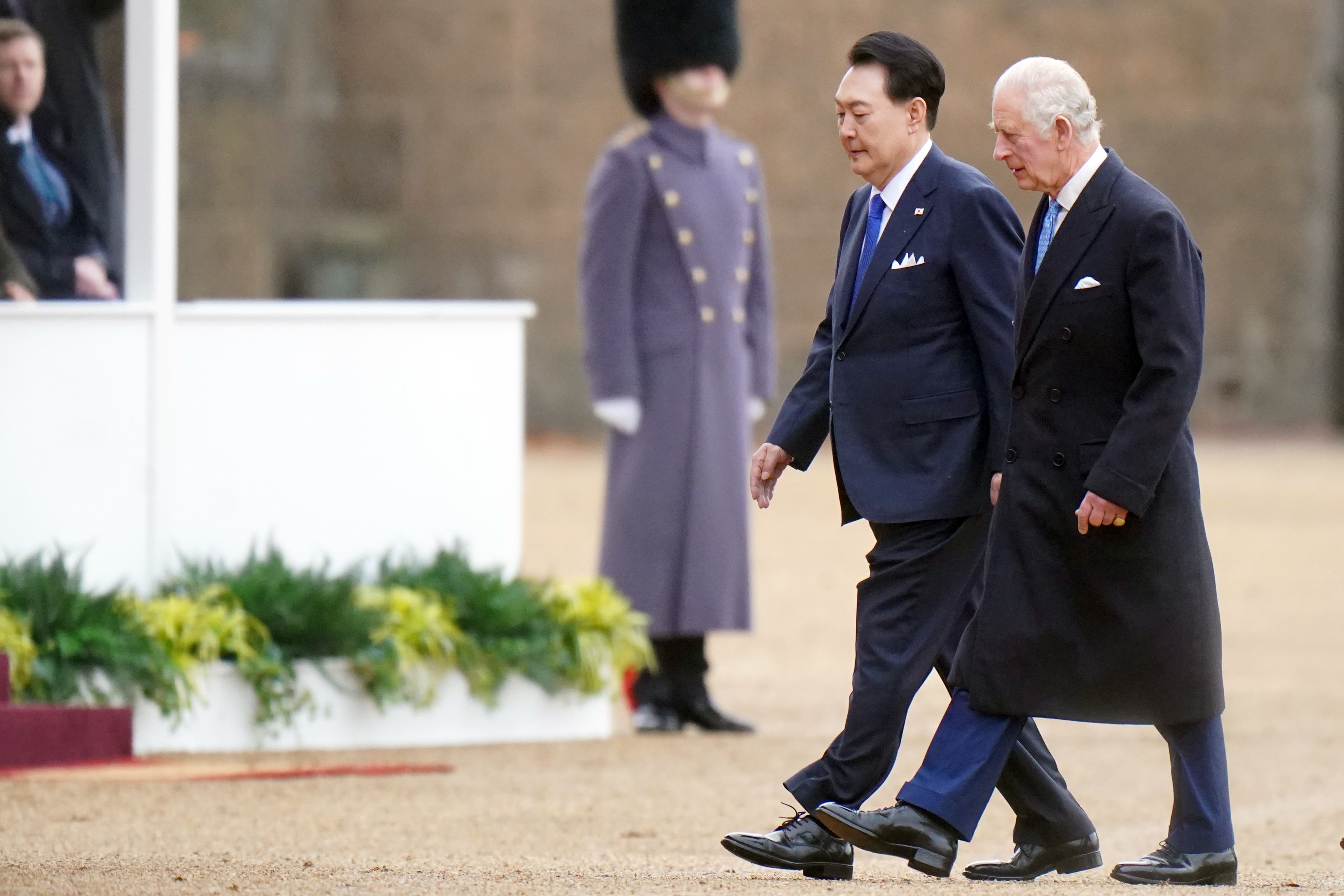 King Charles accompanied the president of South Korea, Yoon Suk Yeol, during the ceremonial welcome (Victoria Jones/PA)