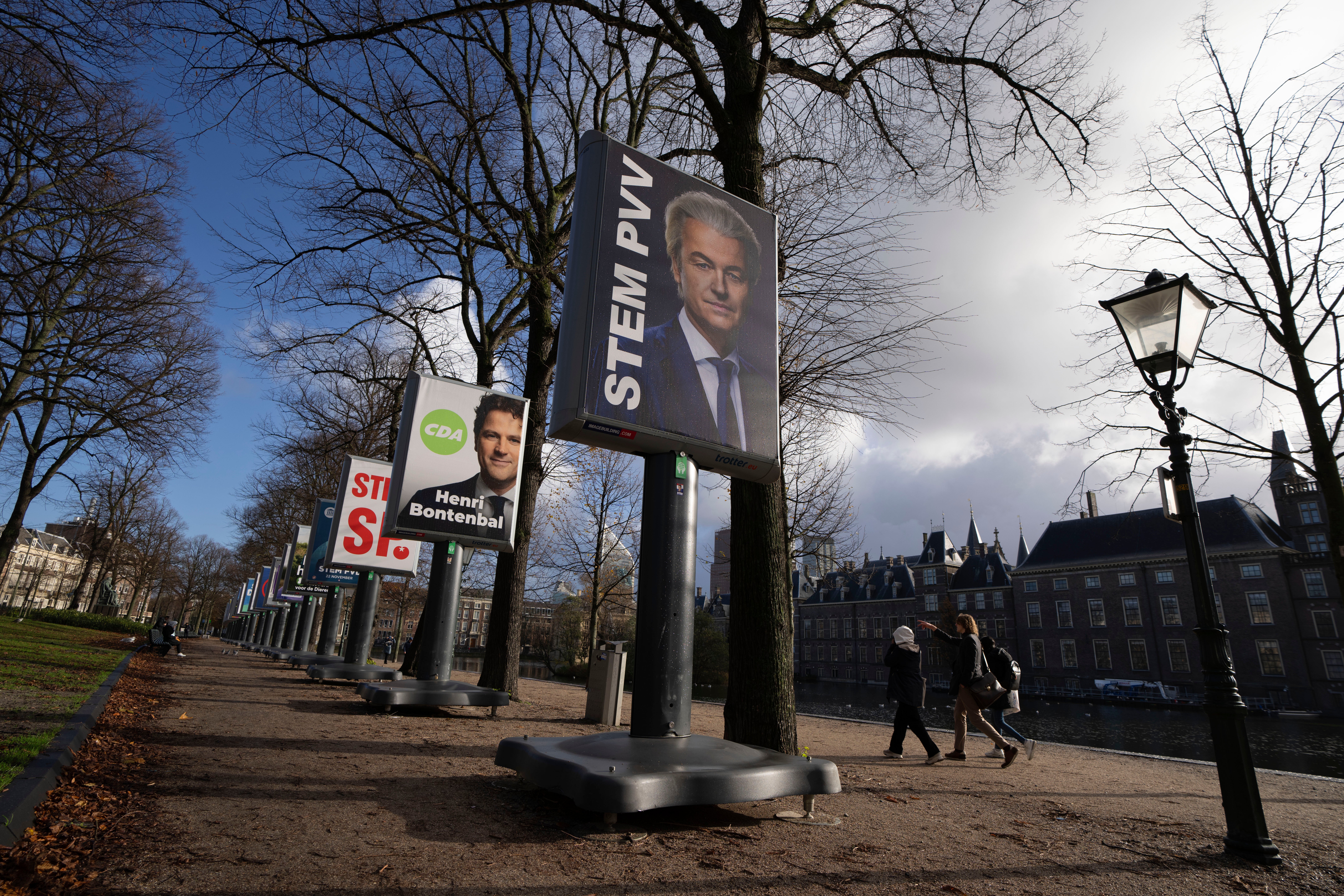 An election billboard for anti-islam lawmaker Geert Wilders is seen near the parliament building in The Hague, Netherlands, Monday, 20 November 2023