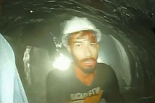 <p>This picture released by Department of Information and Public Relation (DIPR) Uttarakhand and taken with endoscopic camera on 21 November 2023 shows a worker trapped inside the under-construction tunnel, days after it collapsed in the Uttarkashi district of India’s Uttarakhand state</p>