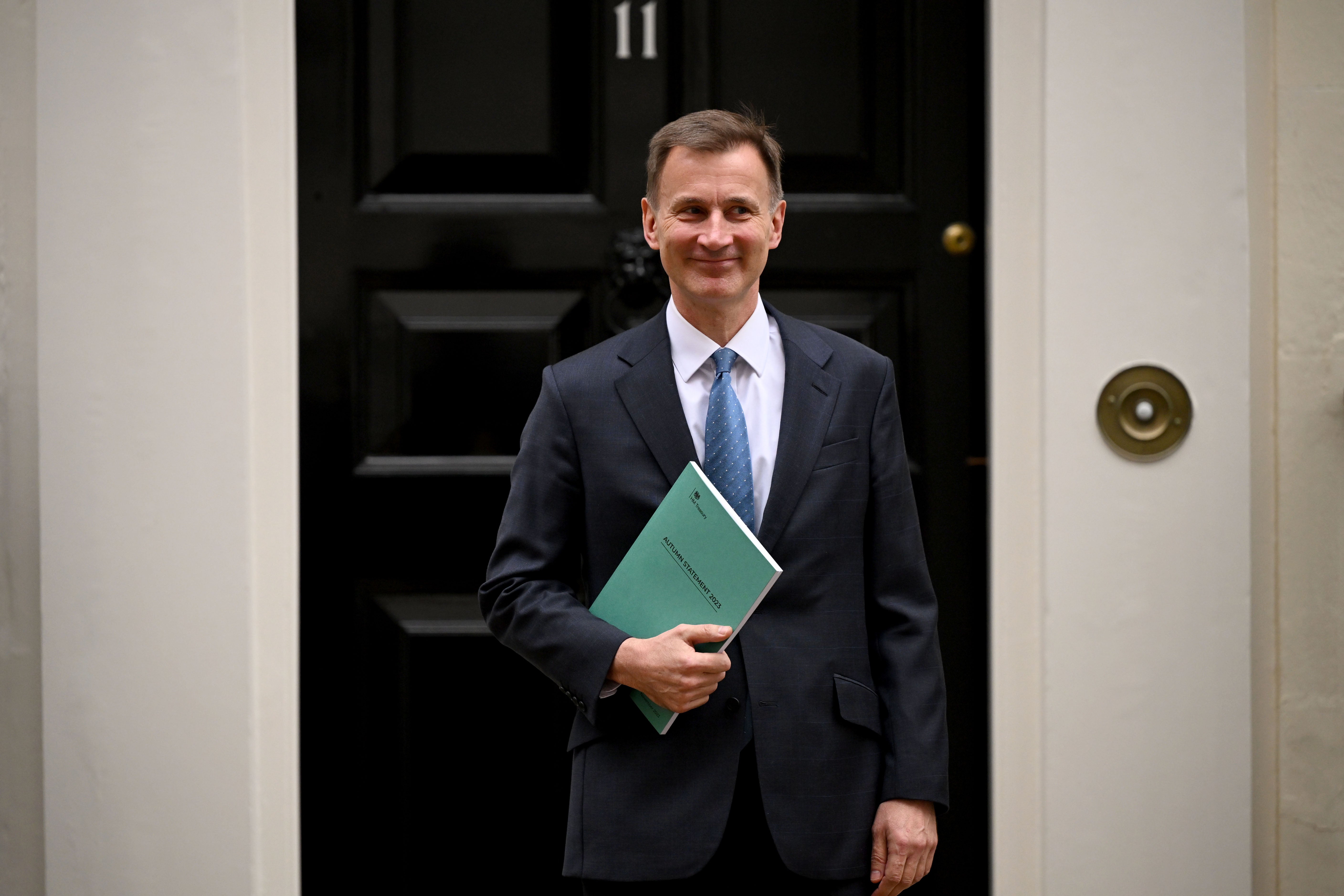 Jeremy Hunt holding his Autumn Statement for Growth